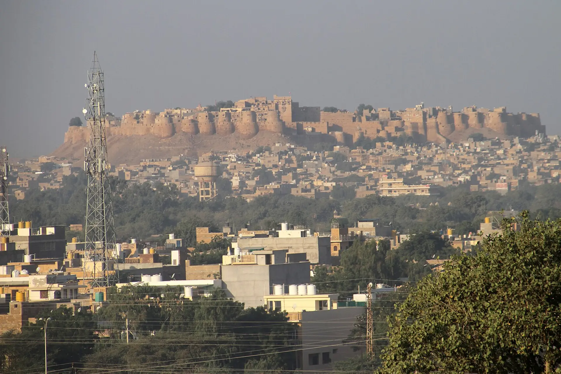 Sandstone ramparts of Jaisalmer Fort rising above the Thar Desert