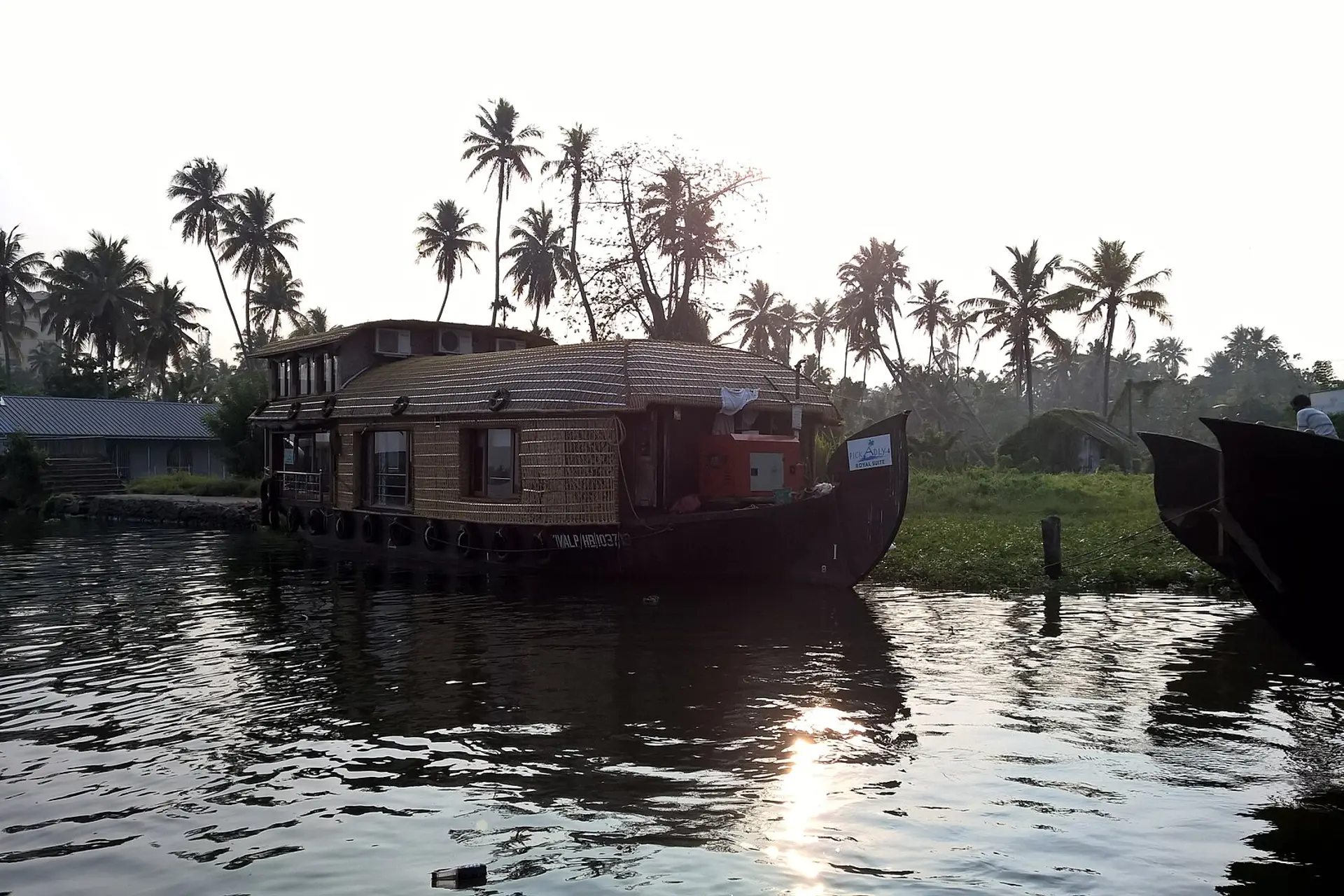 Traditional houseboat cruising the Alleppey backwaters, Kerala